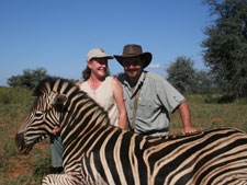 Pieter with Leesa and one of the several Zebra they've taken together