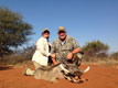 Brad and Dena with Brad's warthog.