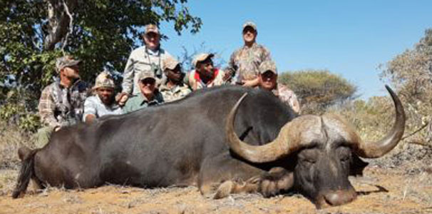 The whole gang with Clark and his Cape Buffalo